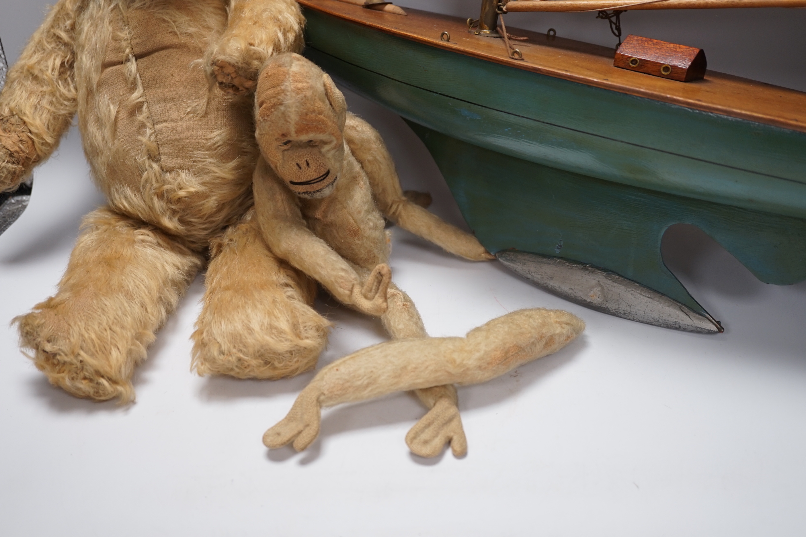 A pond yacht, an English mohair teddy bear and monkey, pond yacht 65cm wide